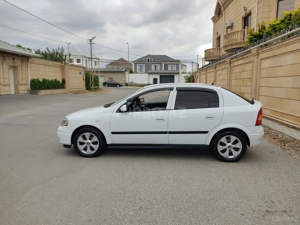 Opel Astra — foto 3/4