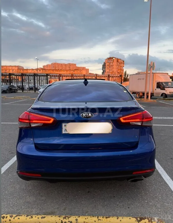 Kia Forte — foto 2/4