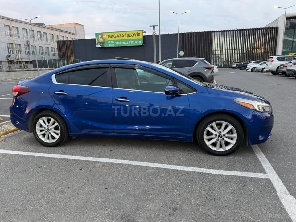 Kia Forte — foto 4/4