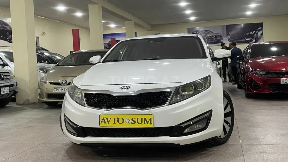 Kia Optima — foto 1/4