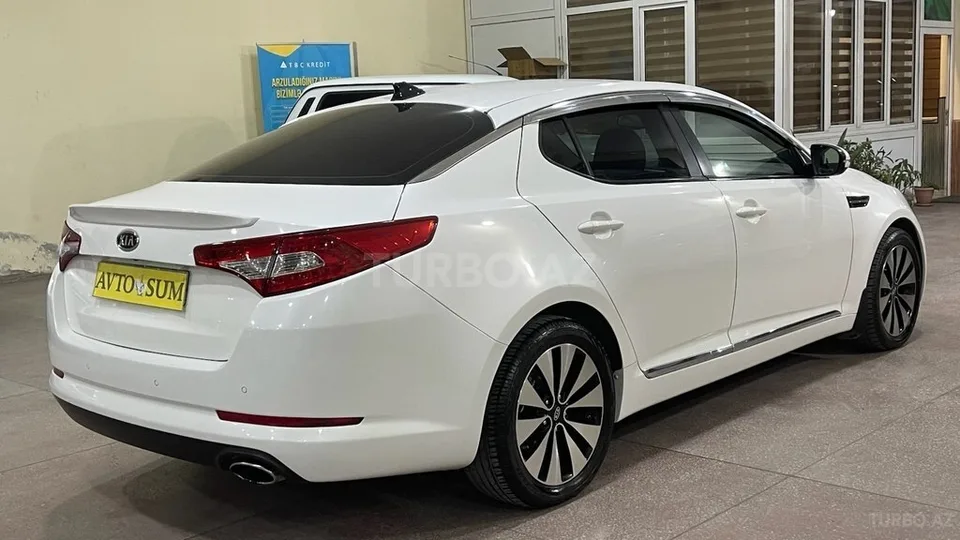 Kia Optima — foto 2/4