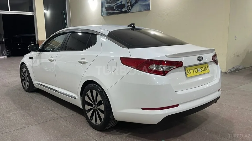 Kia Optima — foto 3/4