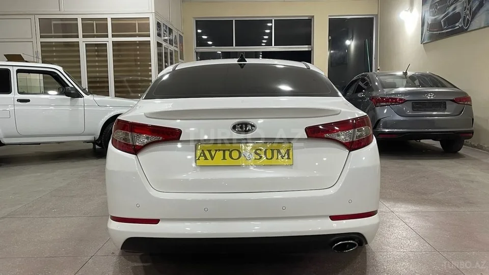 Kia Optima — foto 4/4